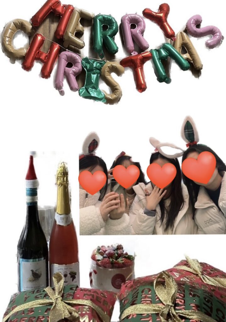 Christmas party photo with friends wearing white outfits and The North Face Sherpa Nuptse Jacket White surrounded by wine, cake, and gifts