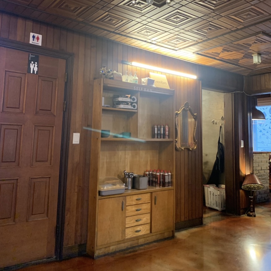 Interior of Ipboonsik Gajeongjip showing warm lighting and retro decor