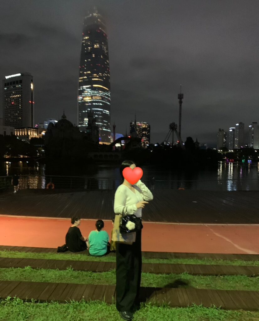 Night view of Seokchon Lake and Lotte Tower near Songridangil, Jamsil