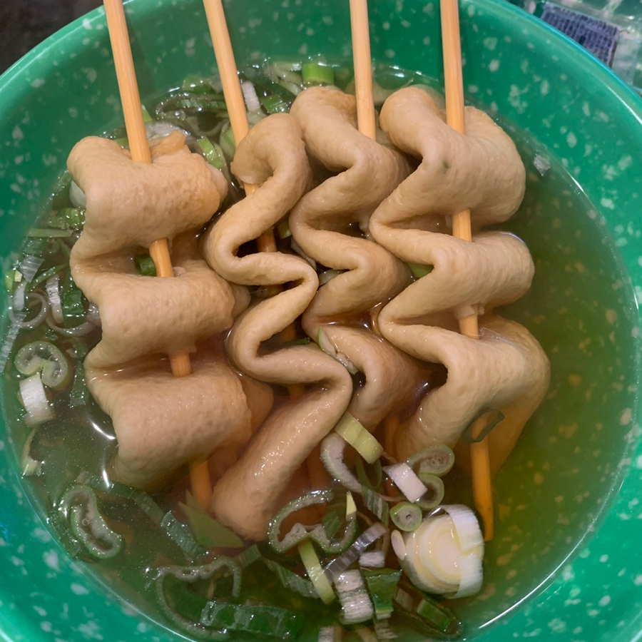 Korean fish cake skewers in warm odeng soup served with spicy instant tteokbokki at Mommytteok Songpa near Songridangil Jamsil