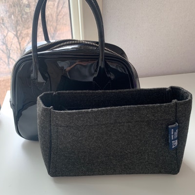 inner bag organizer next to the comme des garcons aoyama bag