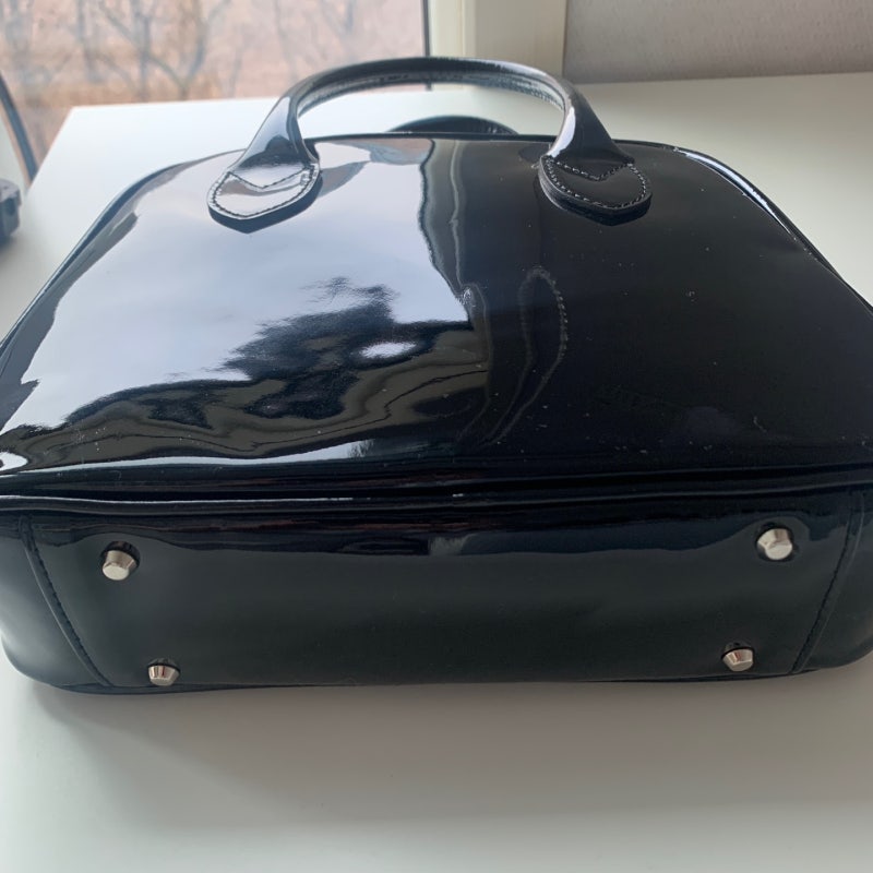 bottom studs of comme des garcons aoyama bag