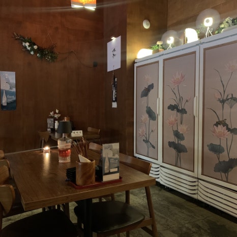 Cozy interior of Sodamhee Jamsil Izakaya wooden tables