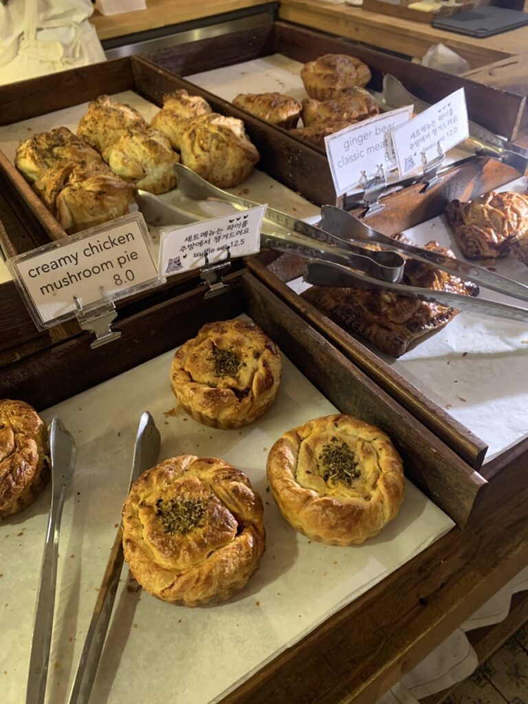 Meat pies and savory pastries at a Songridan-gil Jamsil dessert cafe