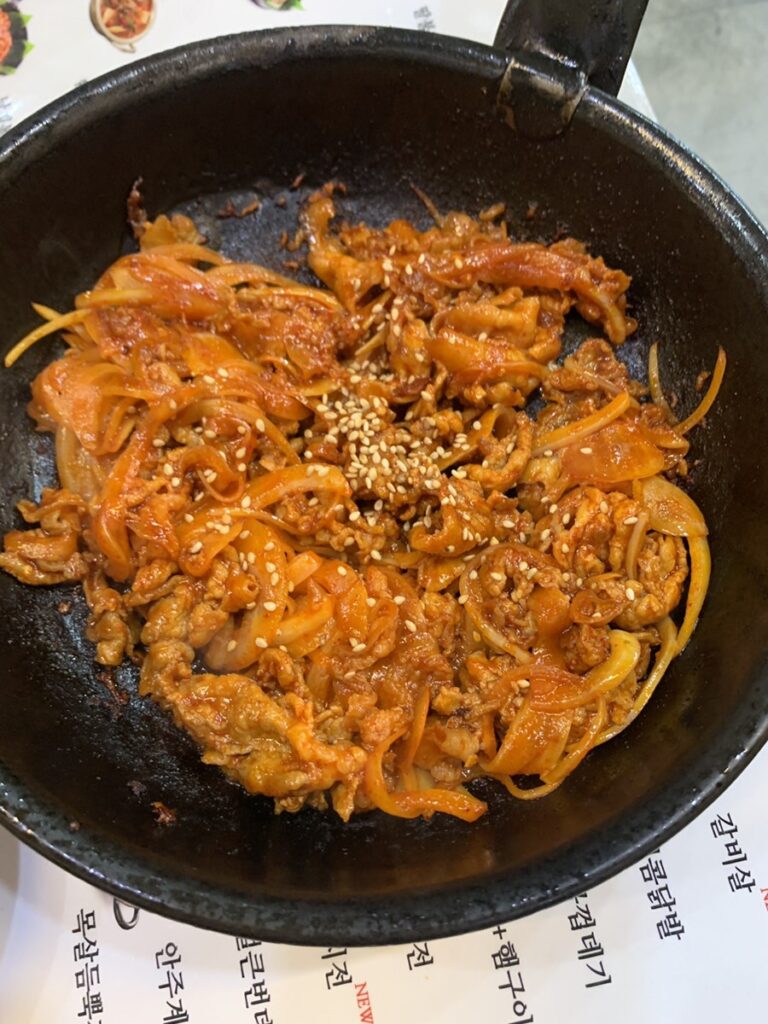 Gangnam Station Korean bulgogi served with onions
