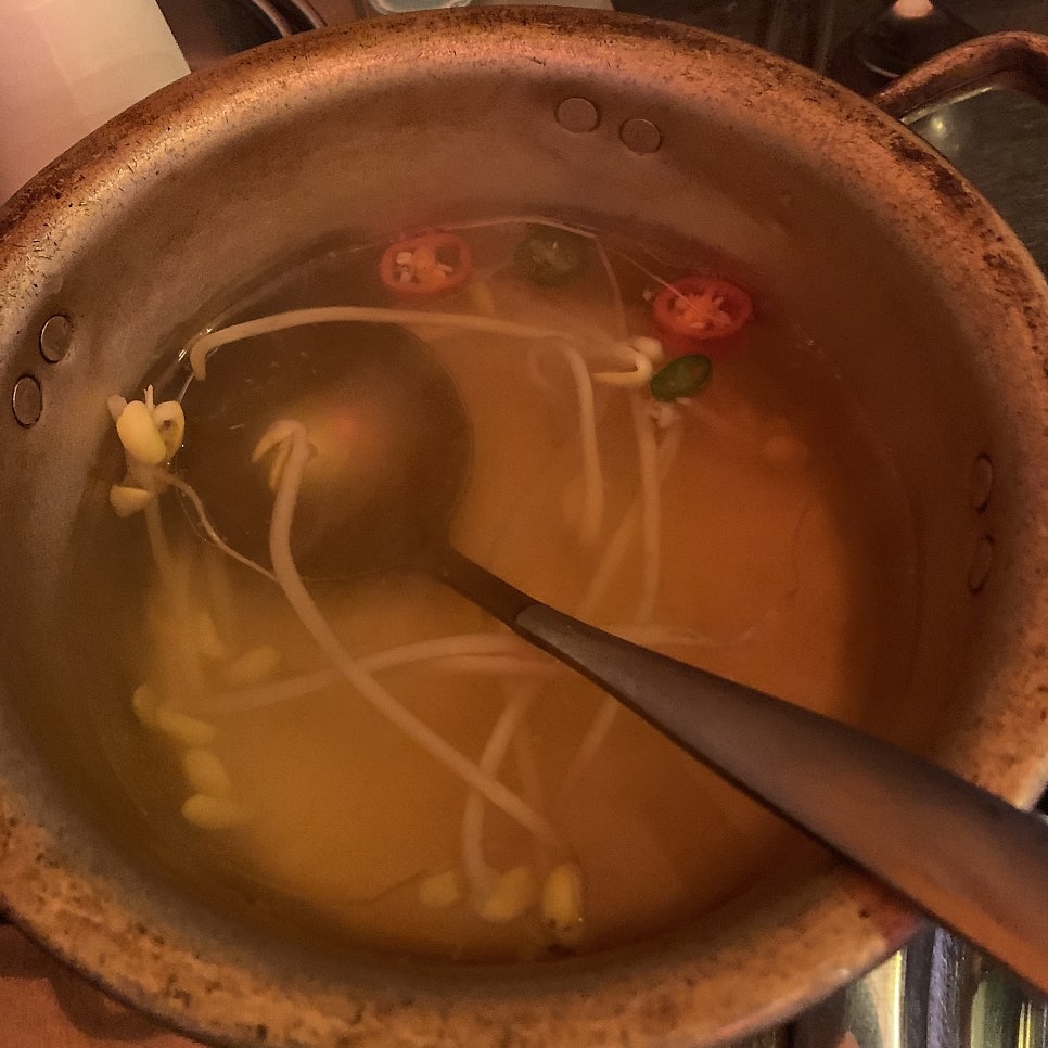 light bean sprout soup with sliced chili peppers
