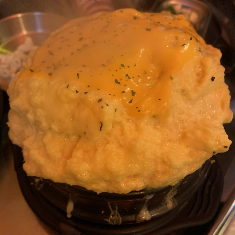 fluffy steamed egg topped with cheese at Park Boksoon Jjukkumi