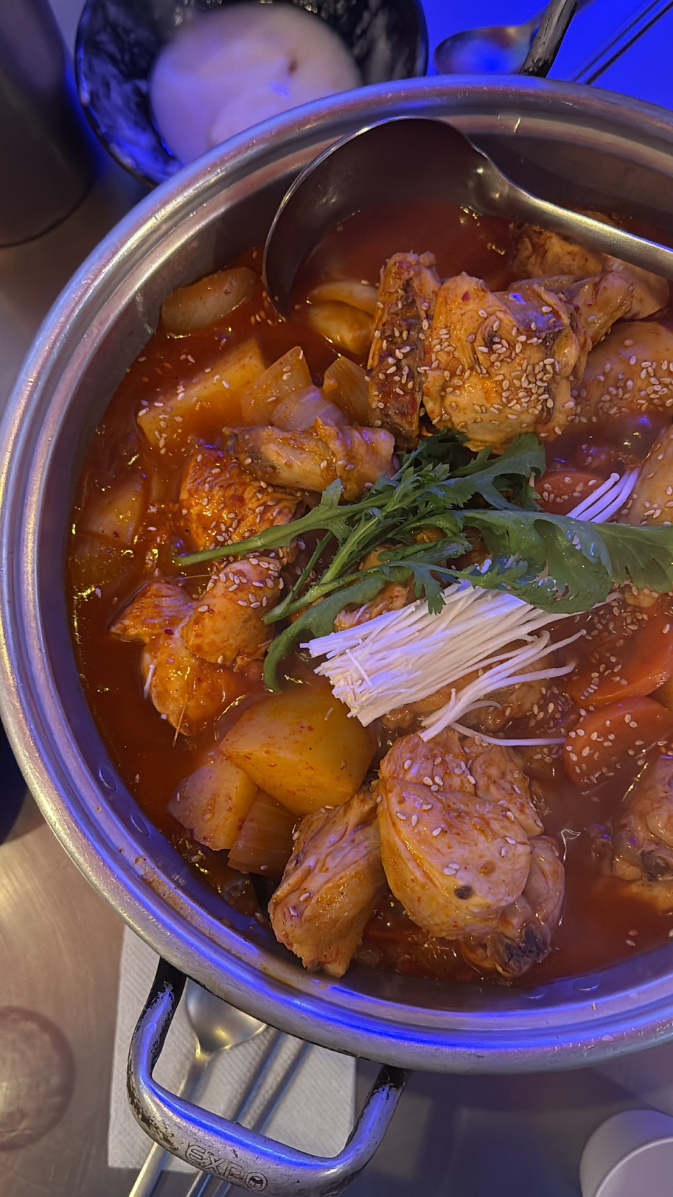 spicy braised chicken stew at a Seokchon Lake pocha with potatoes and vegetables
