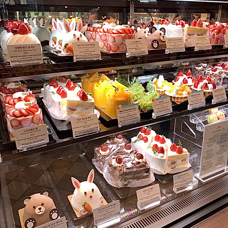Paris Croissant Gangnam Station cakes display with cute strawberry and animal-themed desserts
