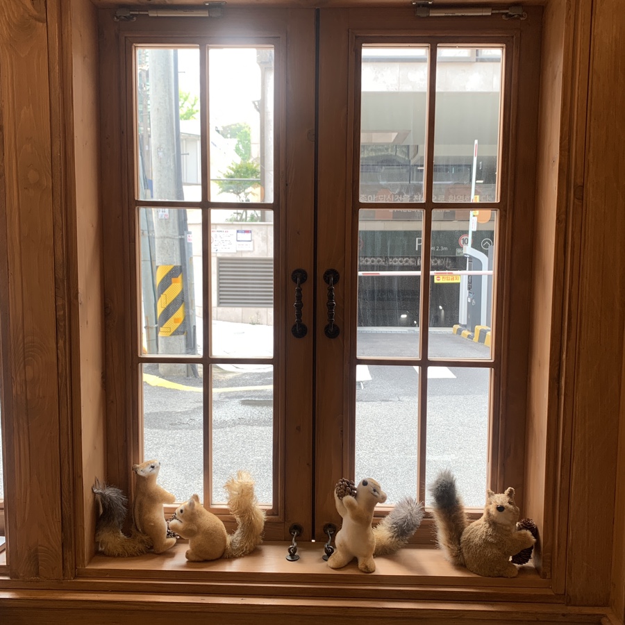 Squirrel plushies by the window inside Cafe Root Gangnam