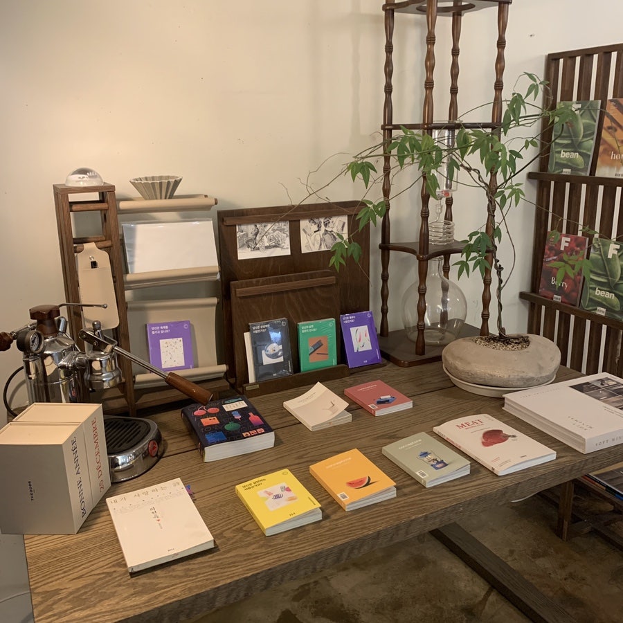 Book and coffee product display at Cafe Root Gangnam in Seoul
