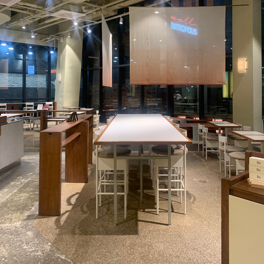 Interior seating area with modern design at a Jongno Canele Cafe