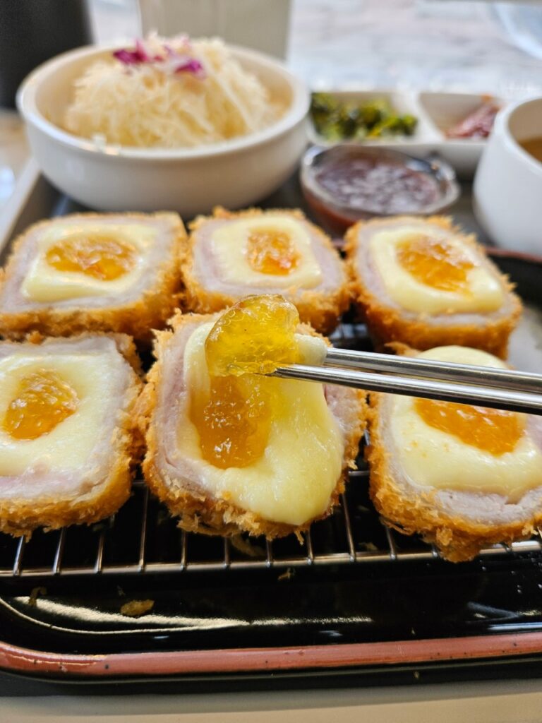 Orange cheese Seokchon Station Tonkatsu with sweet orange jam inside at Gyocajum