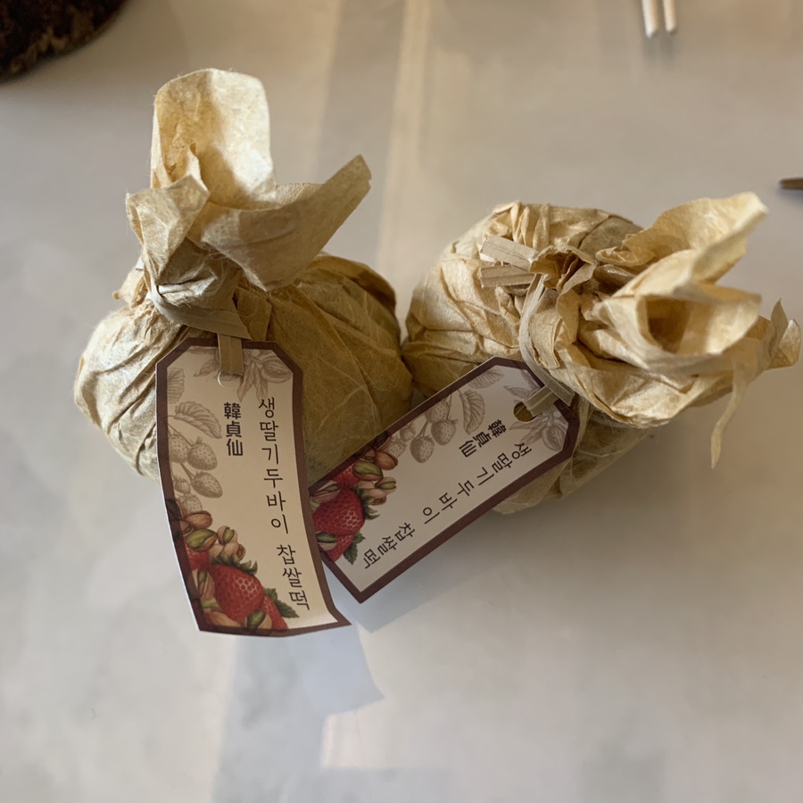 Strawberry Dubai mochi individually wrapped after purchase at a dessert shop in Seongsu