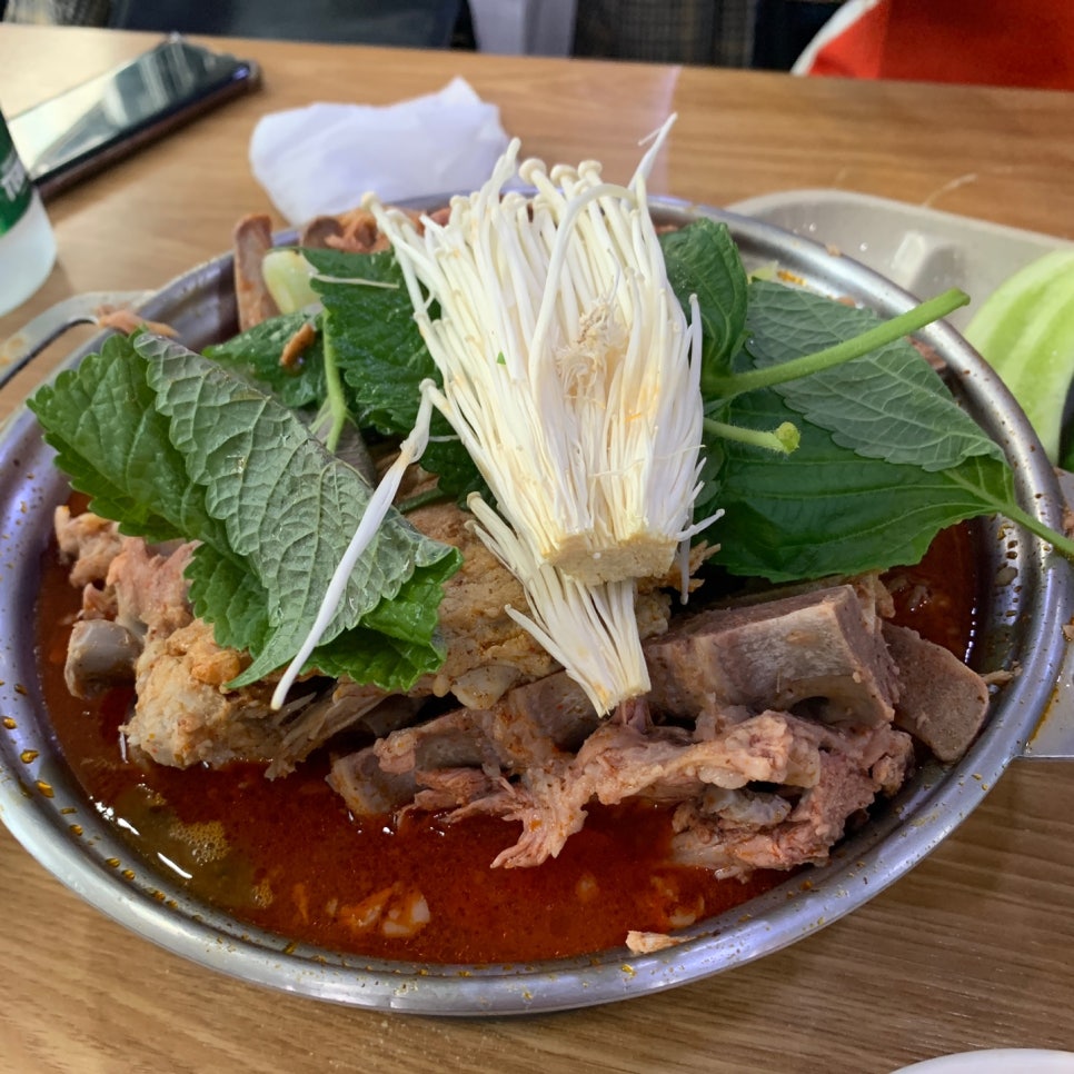korean gamjatang pork bone soup with potatoes and perilla leaves in seongsu