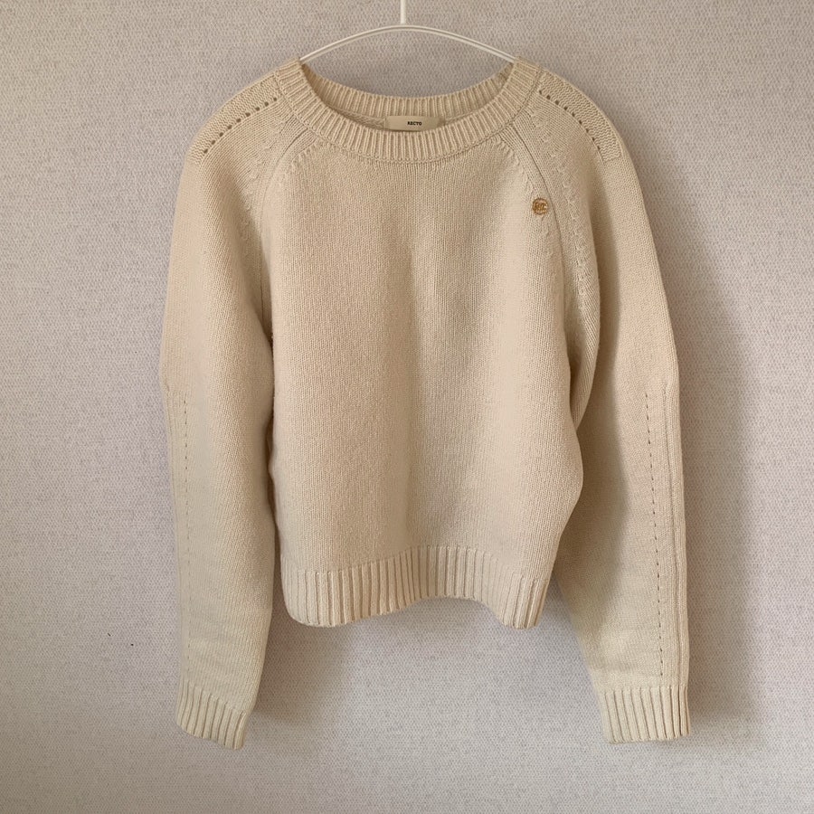 RECTO Signature Round-Neck Knit front view on hanger showing raglan and rib details