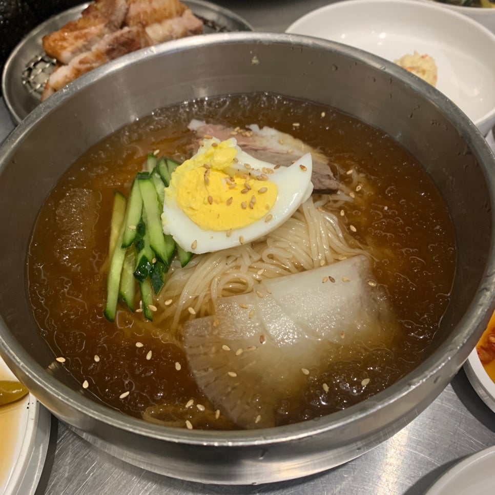 Yeolmu kimchi cold noodles served with Korean pork BBQ