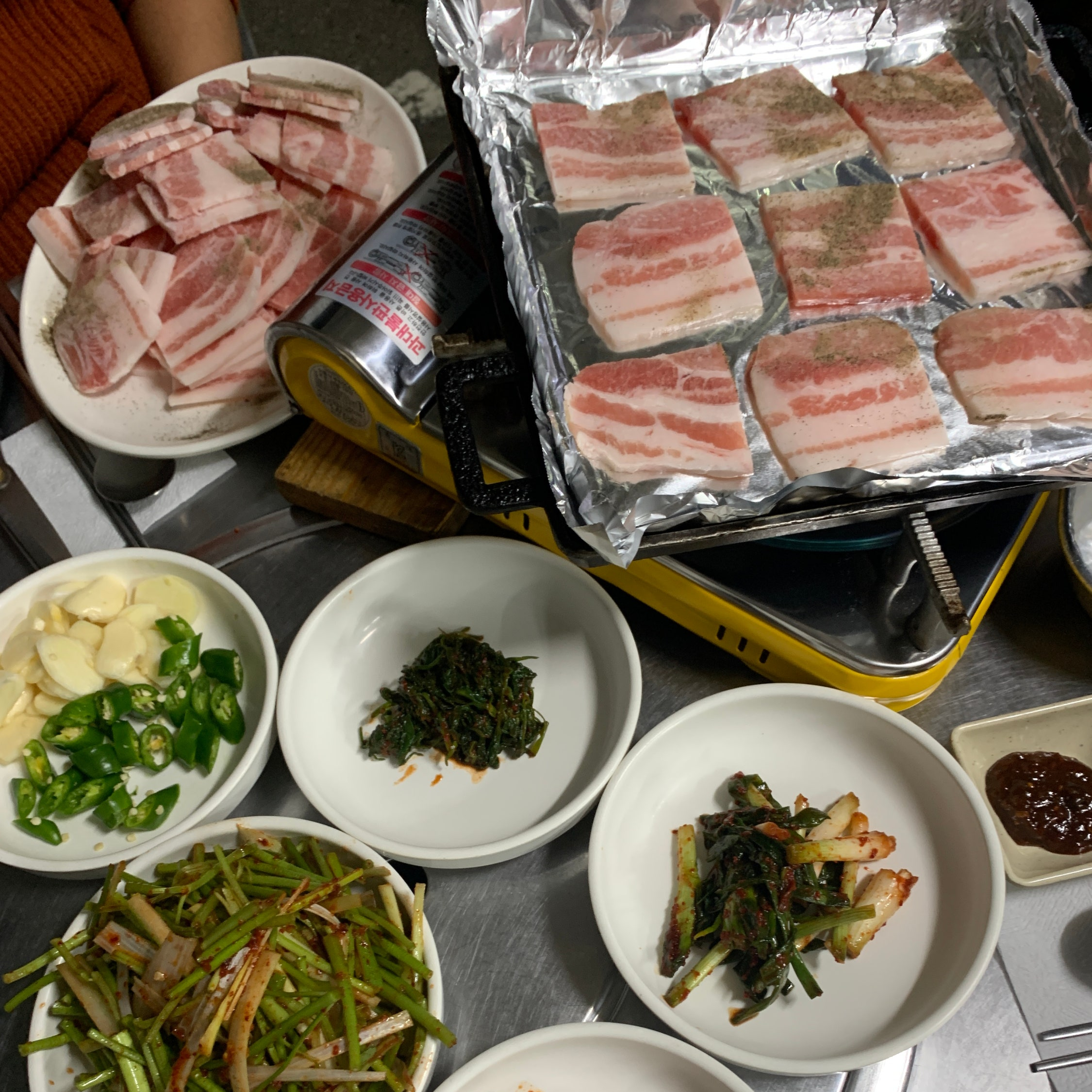 Seoul Forest frozen pork belly with homemade Korean side dishes