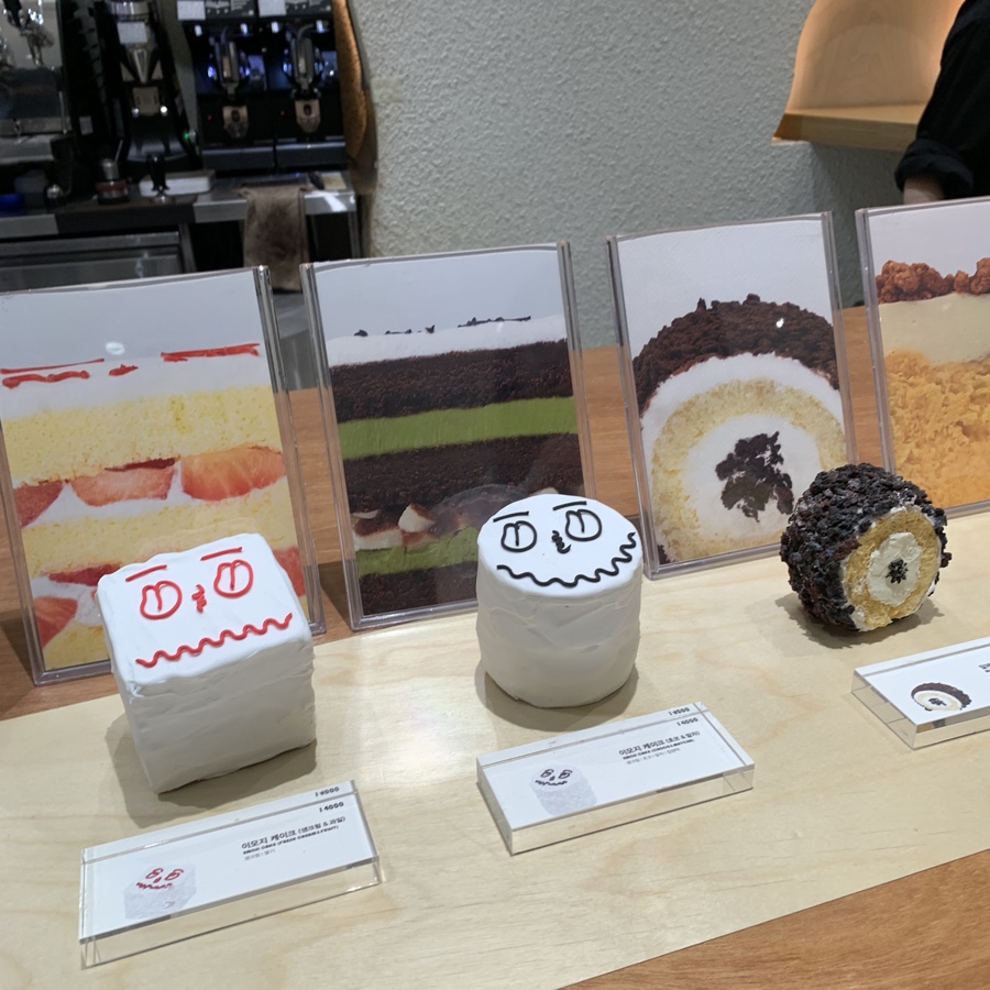 Emoji cakes displayed at Tongue Cafe Lotte World Mall in Jamsil