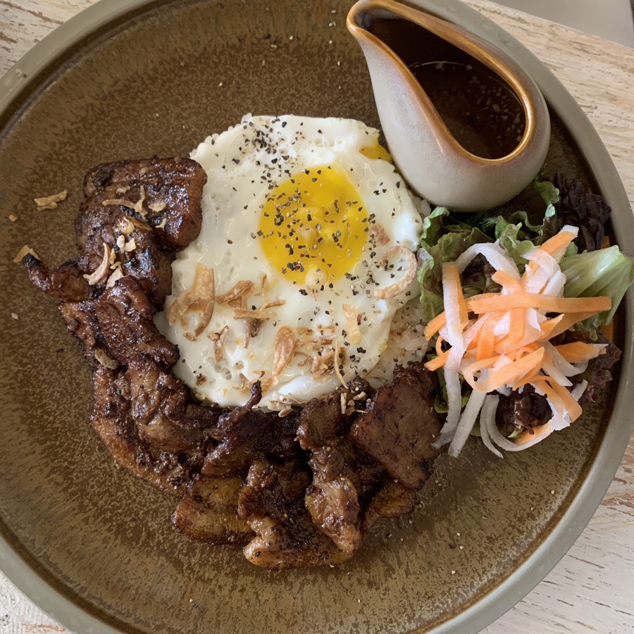 Grilled pork belly rice bowl topped with fried egg at Pho U Seongsu