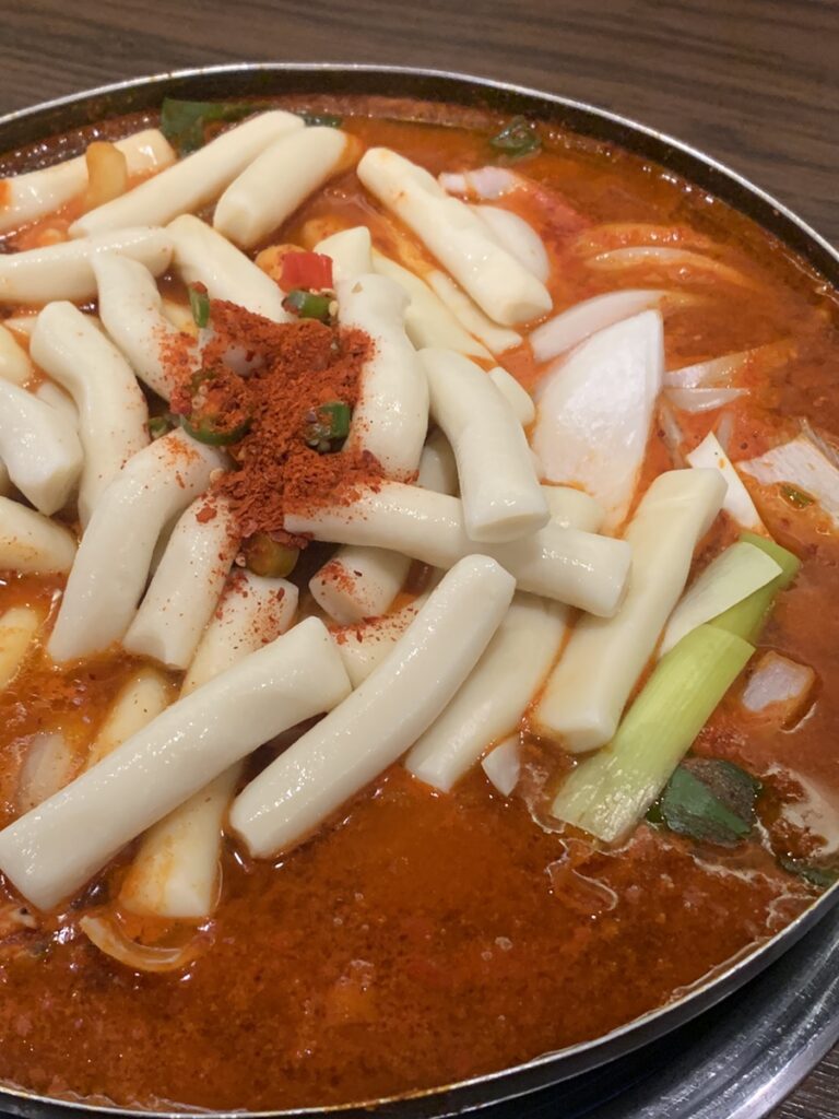 Tteok Doritang Gangnam spicy chicken stew simmering with rice cakes