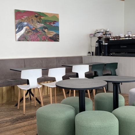 Spacious interior of Sinnonhyeon Station canelé cafe Screme, ideal for working with a laptop