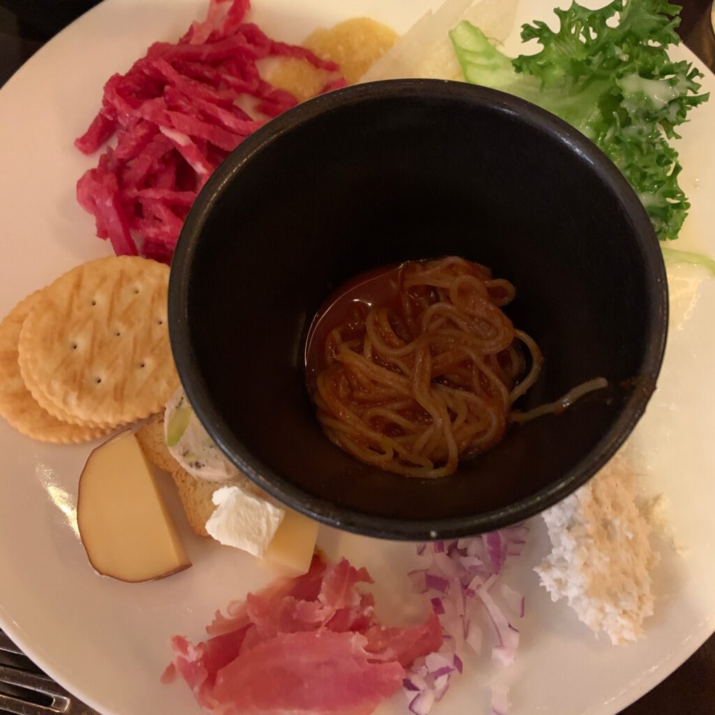 Cheese, crackers, and Korean side dishes at Grand InterContinental Seoul Parnas Grand Kitchen Buffet