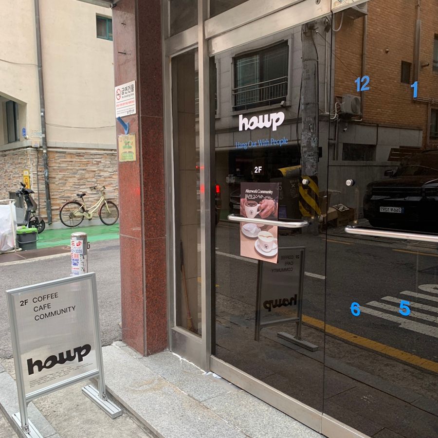 Howp Songridan-gil Cafe entrance on the second floor near Seokchon Station