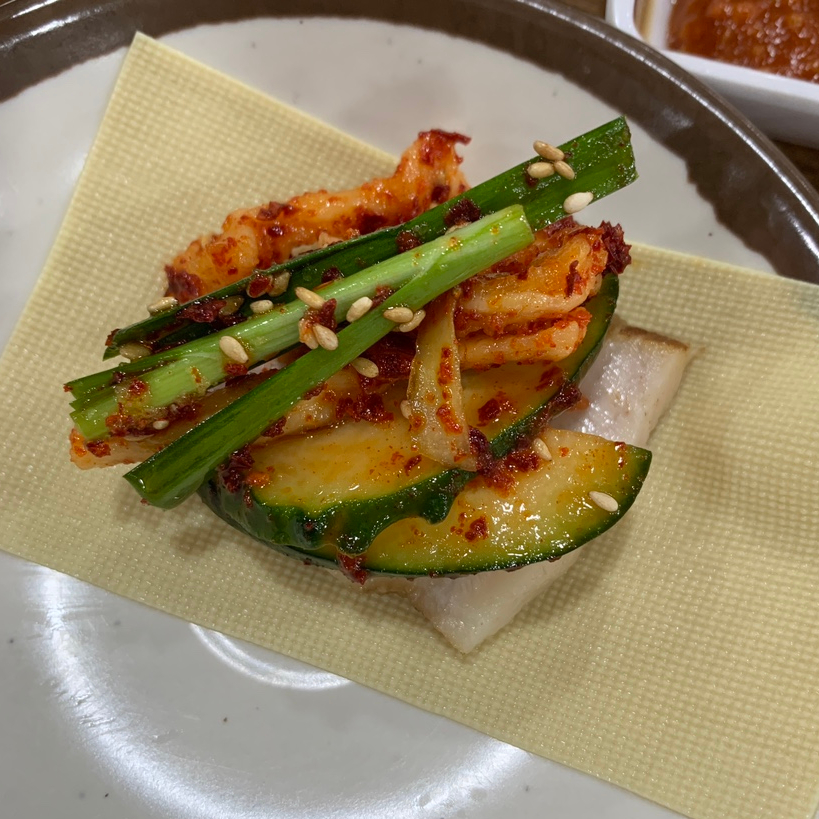 Thin tofu wrap bossam bite at Jamsil Station Bossam Restaurant