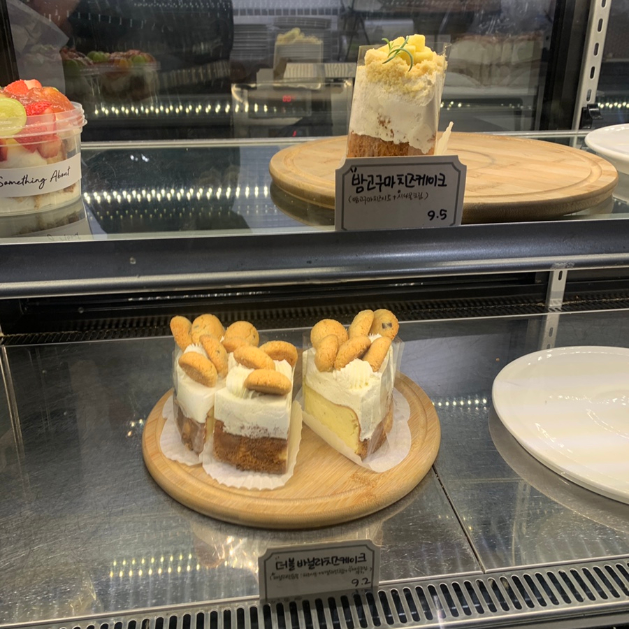 Dessert display with cheesecake at Gangnam cafe Something About Coffee