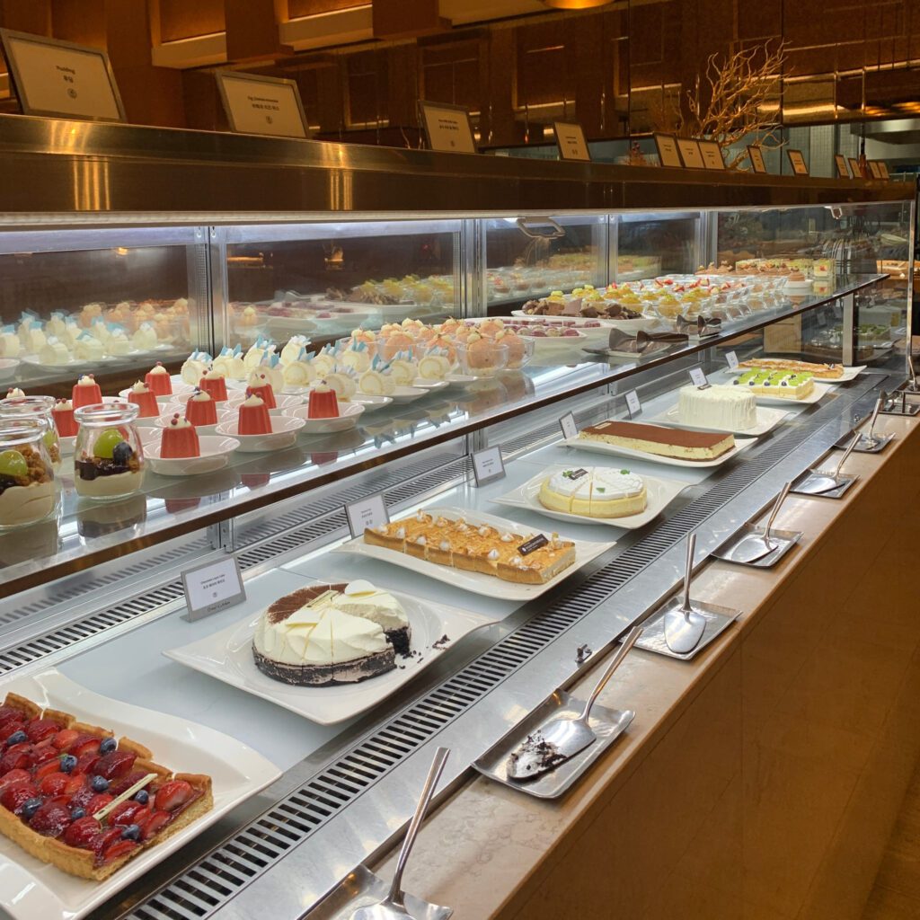 Cake and pastry display at Grand InterContinental Seoul Parnas Grand Kitchen Buffet