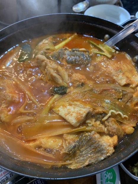 korean spicy fish stew with fish meat and ramen