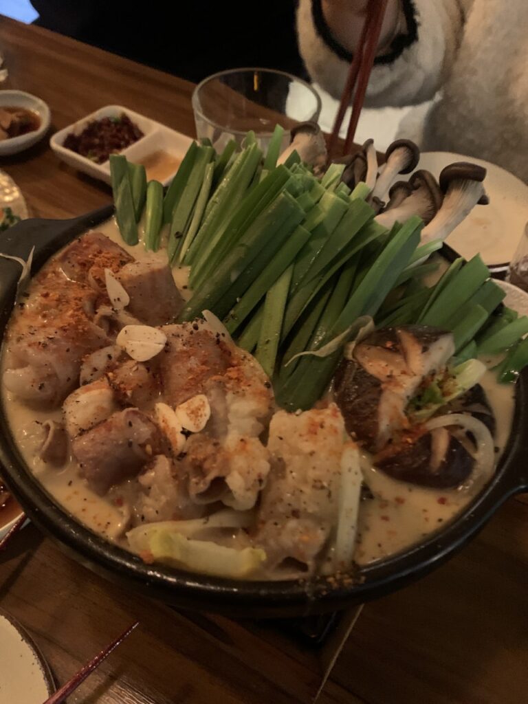 japanese motsunabe hot pot with beef intestines and vegetables