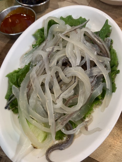 cheonho station seafood restaurant raw squid sashimi fresh korean squid