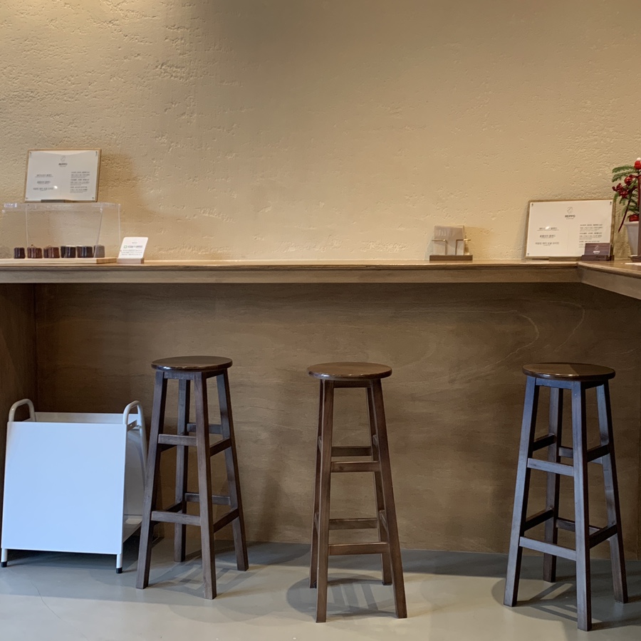 yangjae station cafe reppo coffee interior seating wooden bar stools