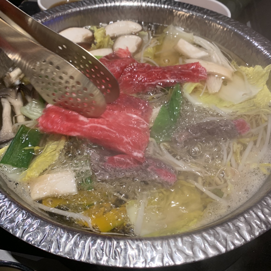 oksoban shabu shabu beef cooking in hot pot seoul restaurant