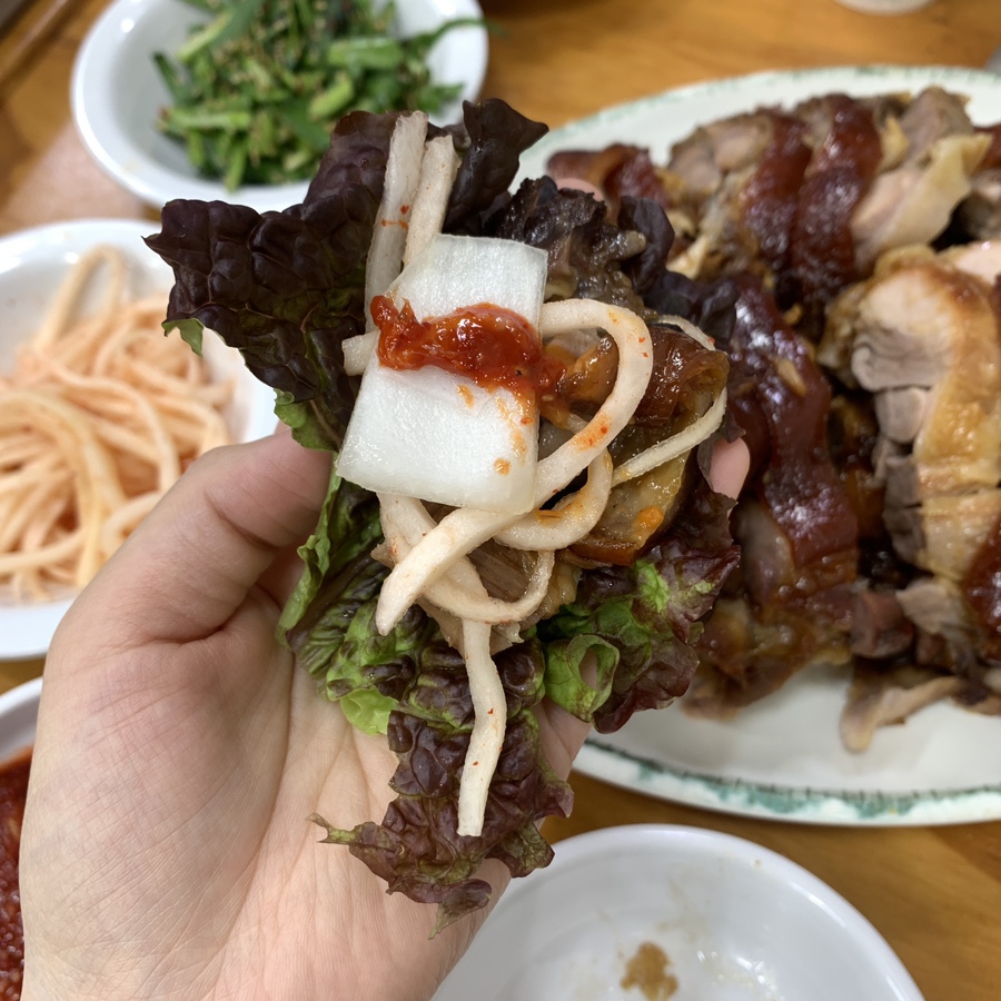 Seongsu Jokbal Seoul jokbal wrap lettuce garlic sauce Korean style