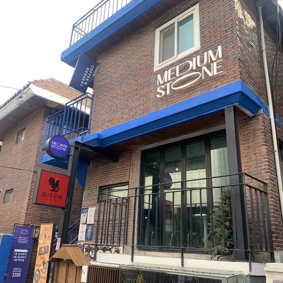 Medium Stone Cafe Seongsu exterior building ttukseom station cafe