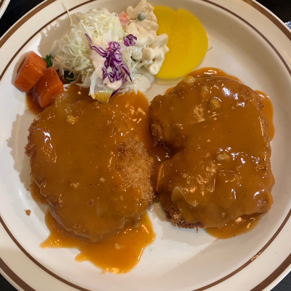 Thick Korean-style pork cutlet with brown sauce at Tonkatsu House Jamsil