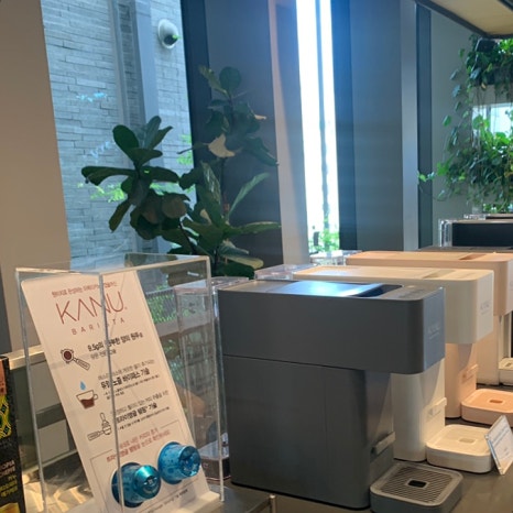 Maxim coffee capsule machine display inside Maxim Plant Hannam cafe