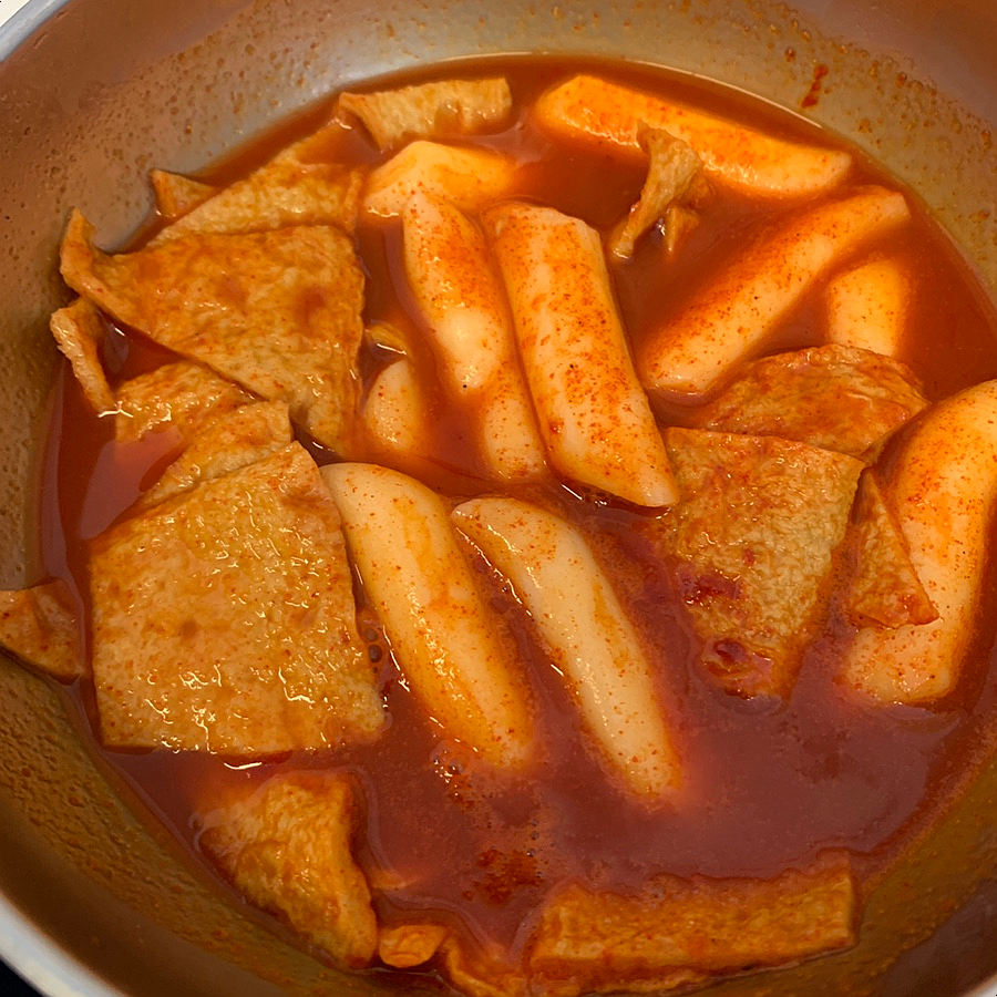 Korean tteokbokki rice cakes with fish cake in spicy sauce
