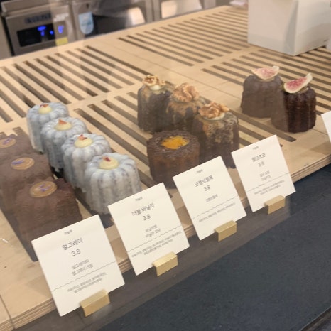 canele desserts at Seoul Express Bus Terminal cafe assorted flavors display