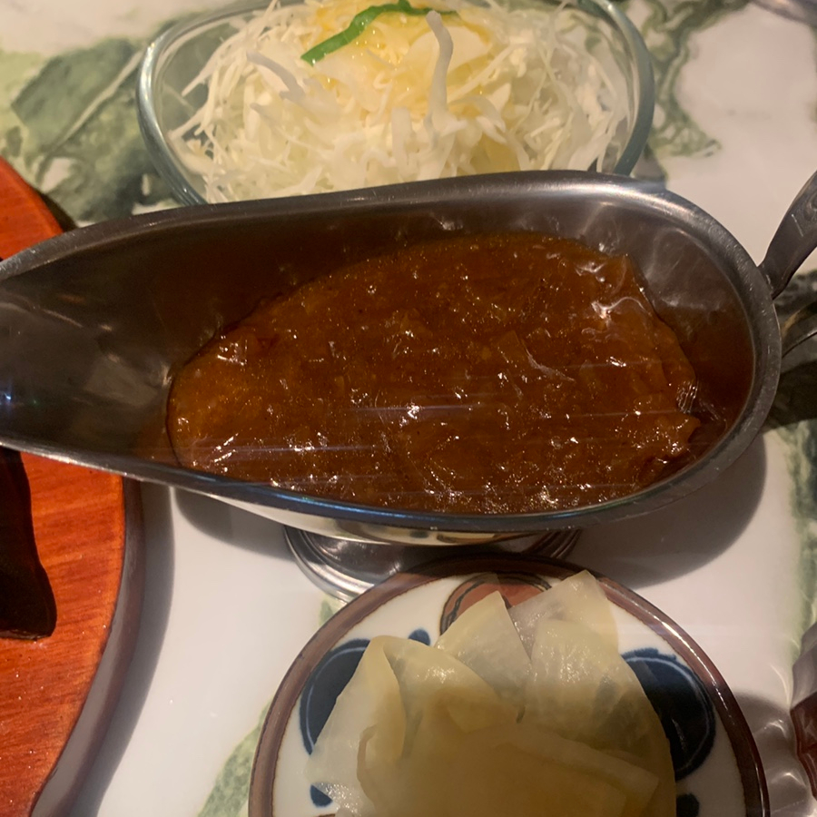 hanwoo hambak steak with sauce and cabbage salad