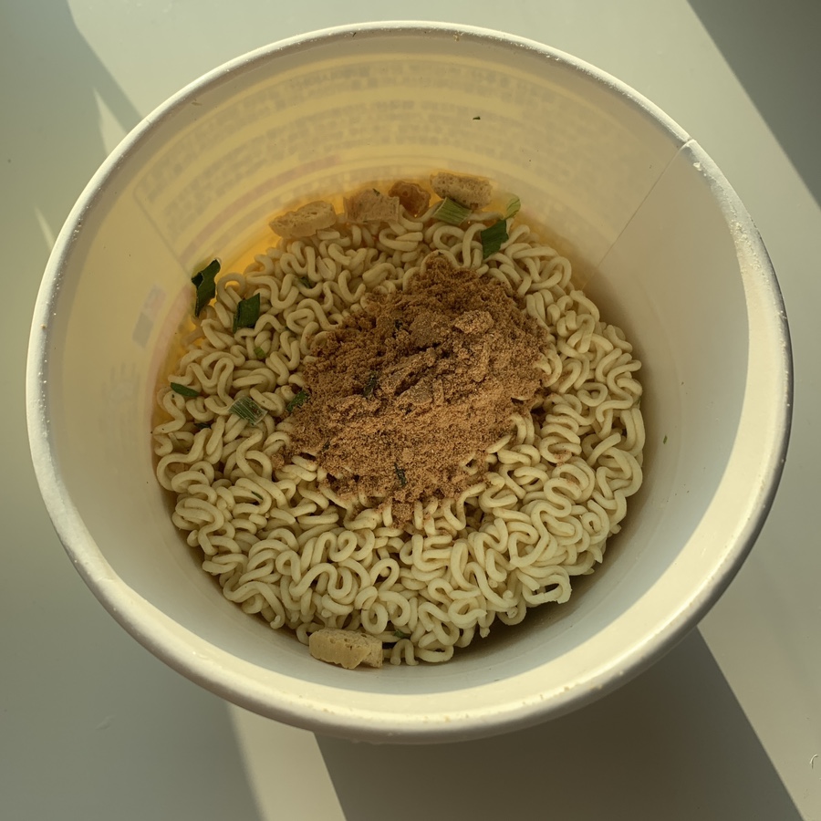korean fish cake ramen cup uncooked noodles seasoning in cup