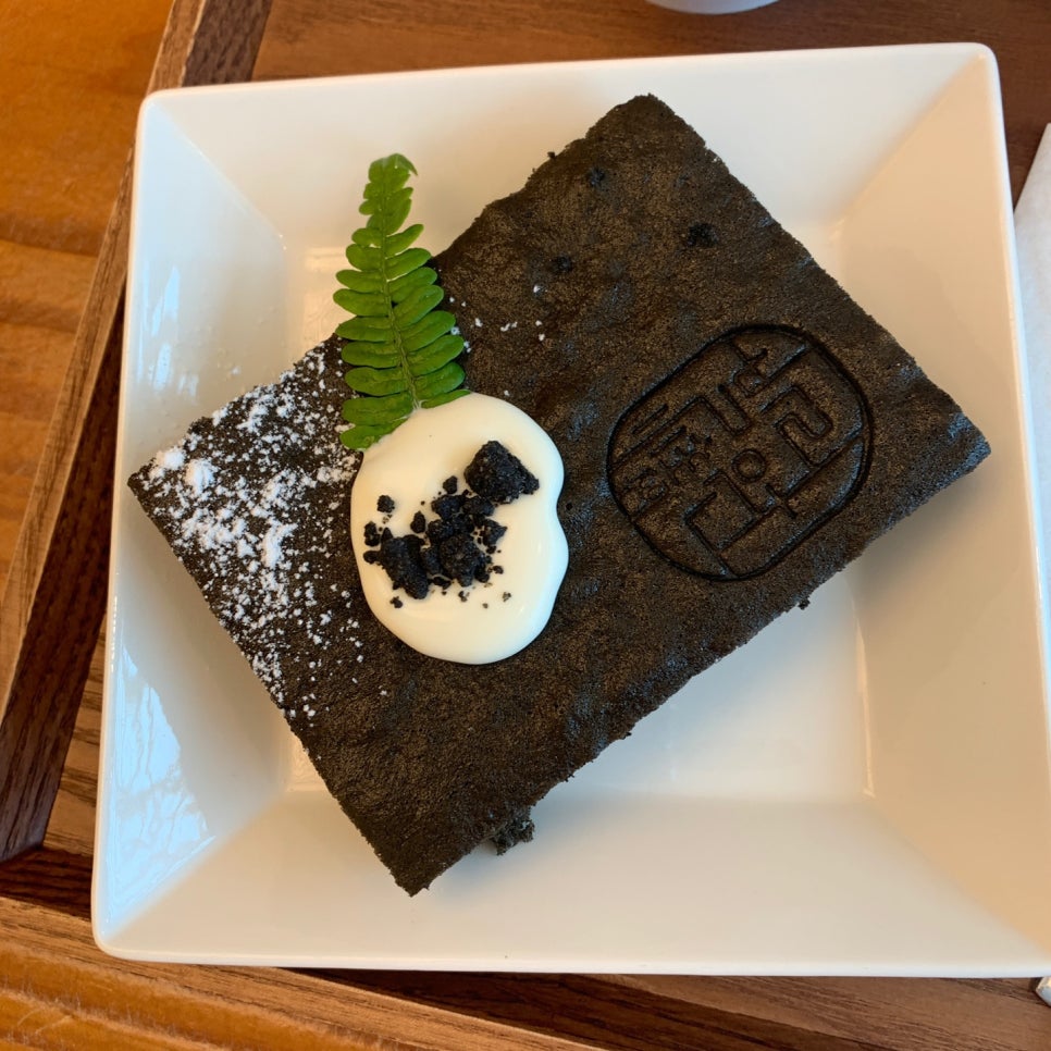 Bali Garden Ulsan petroglyph black sesame castella dessert inspired by Bangudae petroglyphs