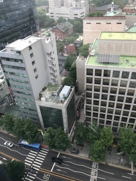 City Hall cafe Seoul street view from above with urban city scenery