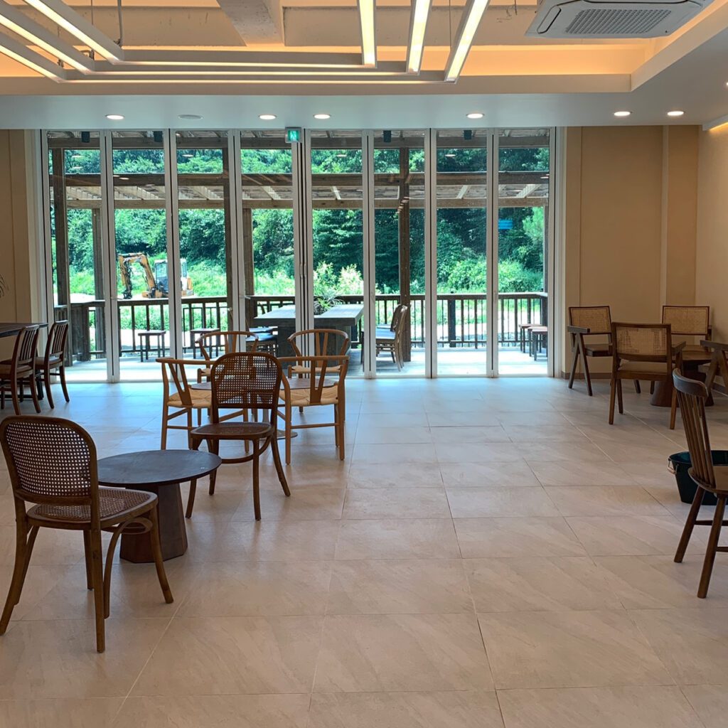 Bali Garden Ulsan spacious cafe interior with garden view