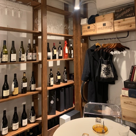 wine bottle display shelf cozy interior NOSE wine bar Seoul