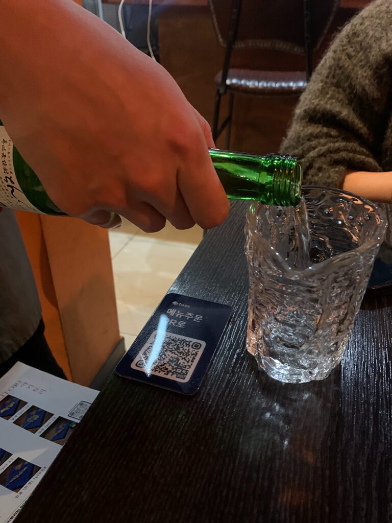 chingu barley soju pouring korean izakaya drink