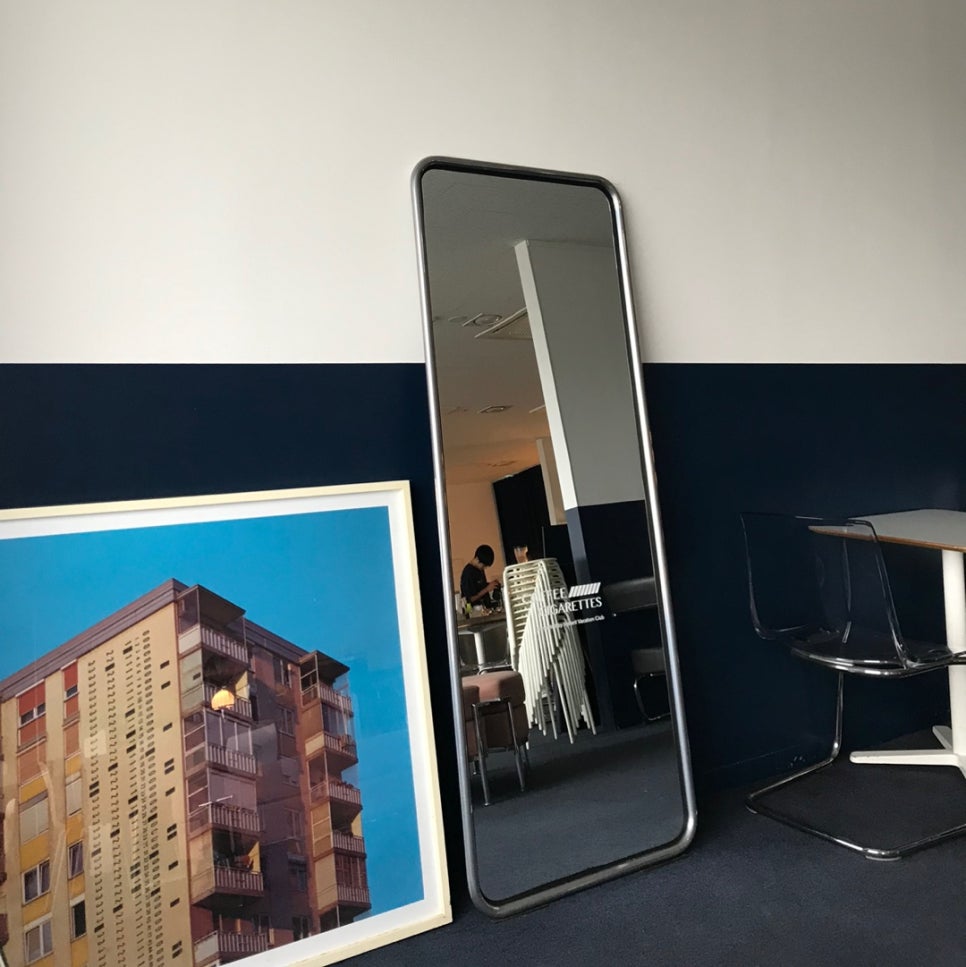 City Hall cafe Seoul interior with modern blue white design and mirror decor